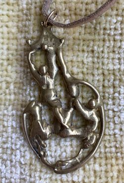 EXTREMELY Uniqueand unusual “Twisted bodies” pendant