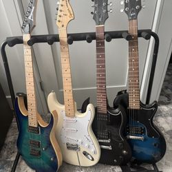 IBANEZ FENDER GIBSON EPIPHONE WITH GIG BAGS AND STAND FOR ONLY 700