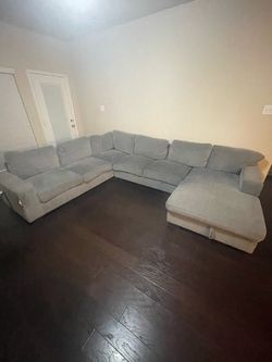 Large Living Spaces U-Shaped Sectional with Sleeper Pull-Out & Storage Chaise – Grey