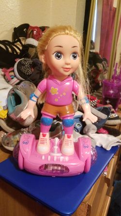 Light up spinning doll