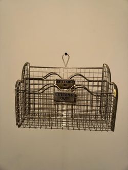 Vintage gold tone metal wire letter holder. Fits neatly on your desktop or could be hung on a wall. Back compartment is for IN and front is for OUT. 1