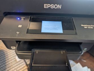Epson All in One Printer with 7 black ink cartridges