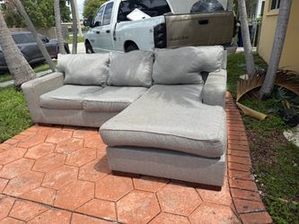 Sofa en L color gris