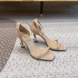 Beige high heels