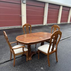 Solid Wood Dinning Table And 4 Chairs $100