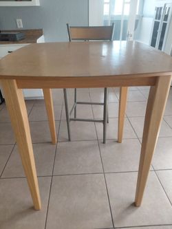 One tall table and one chair