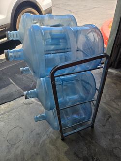 6 5 gallon jugs with stand
