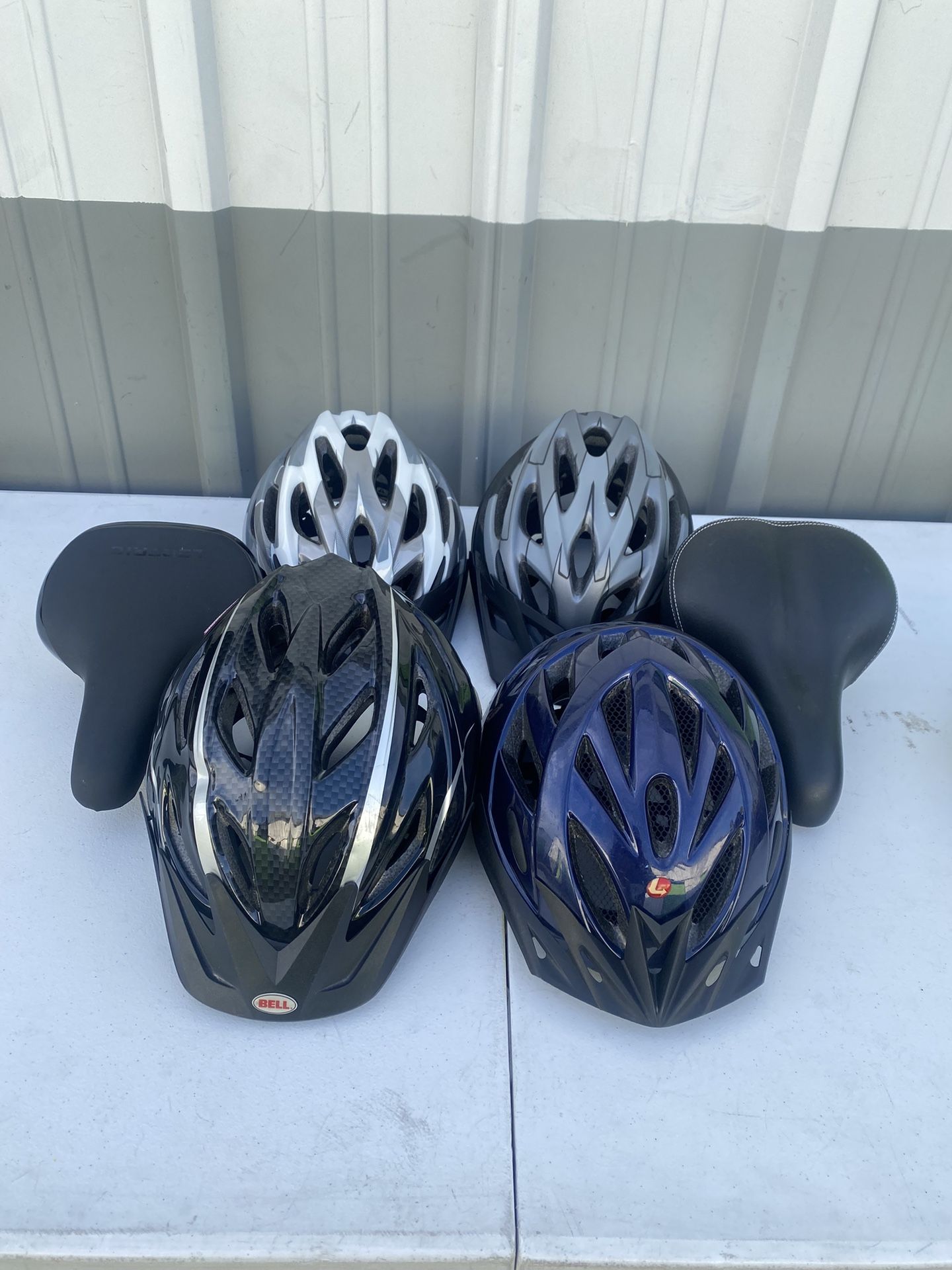 HELMETS AND SEATS FOR BIKE  $15 Each 
