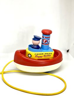 Fisher PriceVINTAGE1967 Tuggy Tooter Boat Pull Toy for Sale in