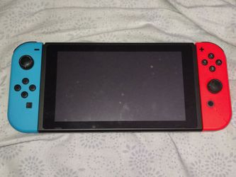 Nintendo Switch with original joycons (slightly broken but works perfectly)