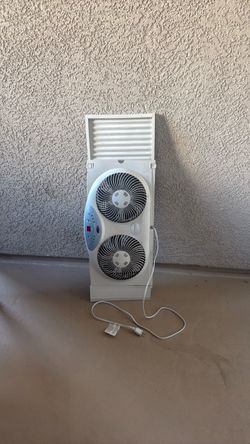 Window Fan with Reversible Airflow Blades