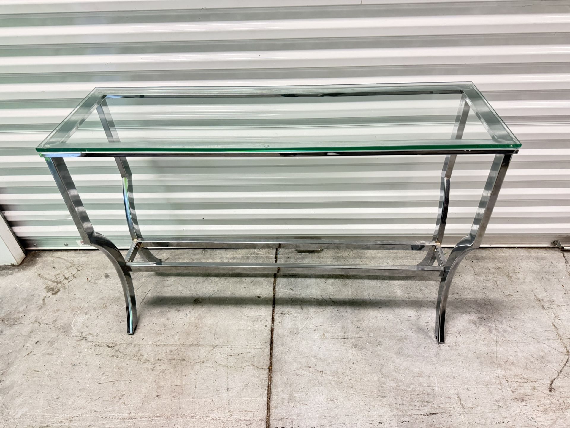 Entrance console table with transparent tempered glass top and chrome-plated metal