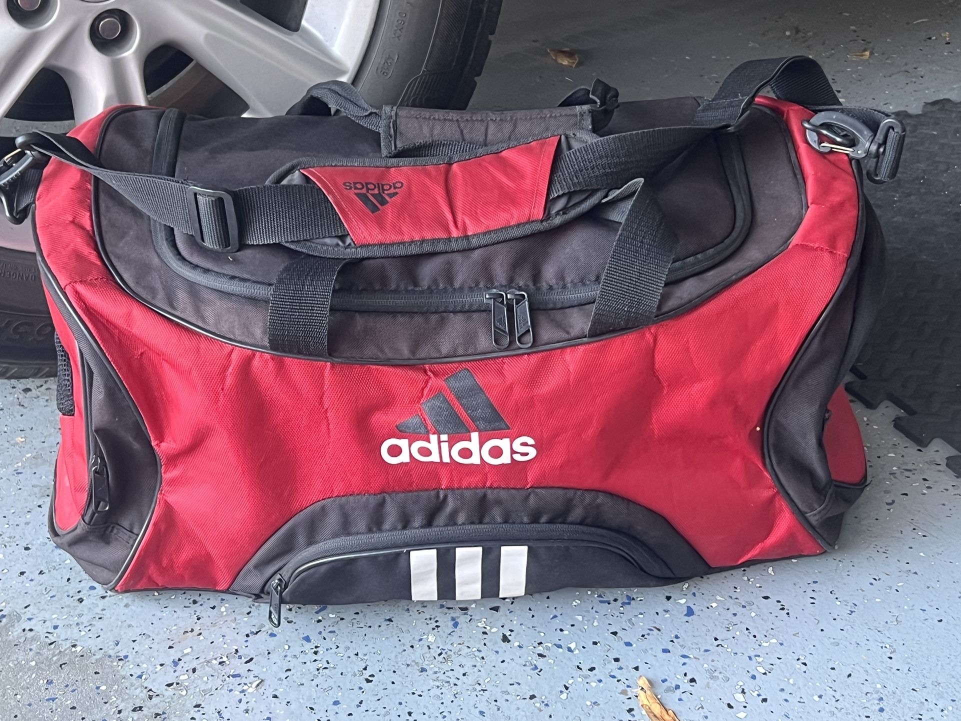 Adidas Duffel Bag color: Red。 Size: 22" x 12" x 12"