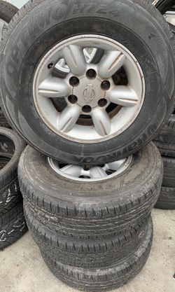 Nissan truck wheels 15”