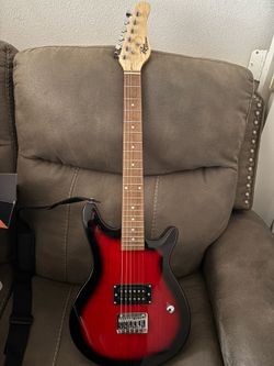 Rogue Rocketeer RR50 7/8-scale electric guitar