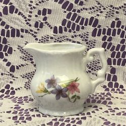 Vintage miniature porcelain pitcher white with flowers 2” tall 