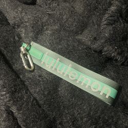 green lululemon keychain