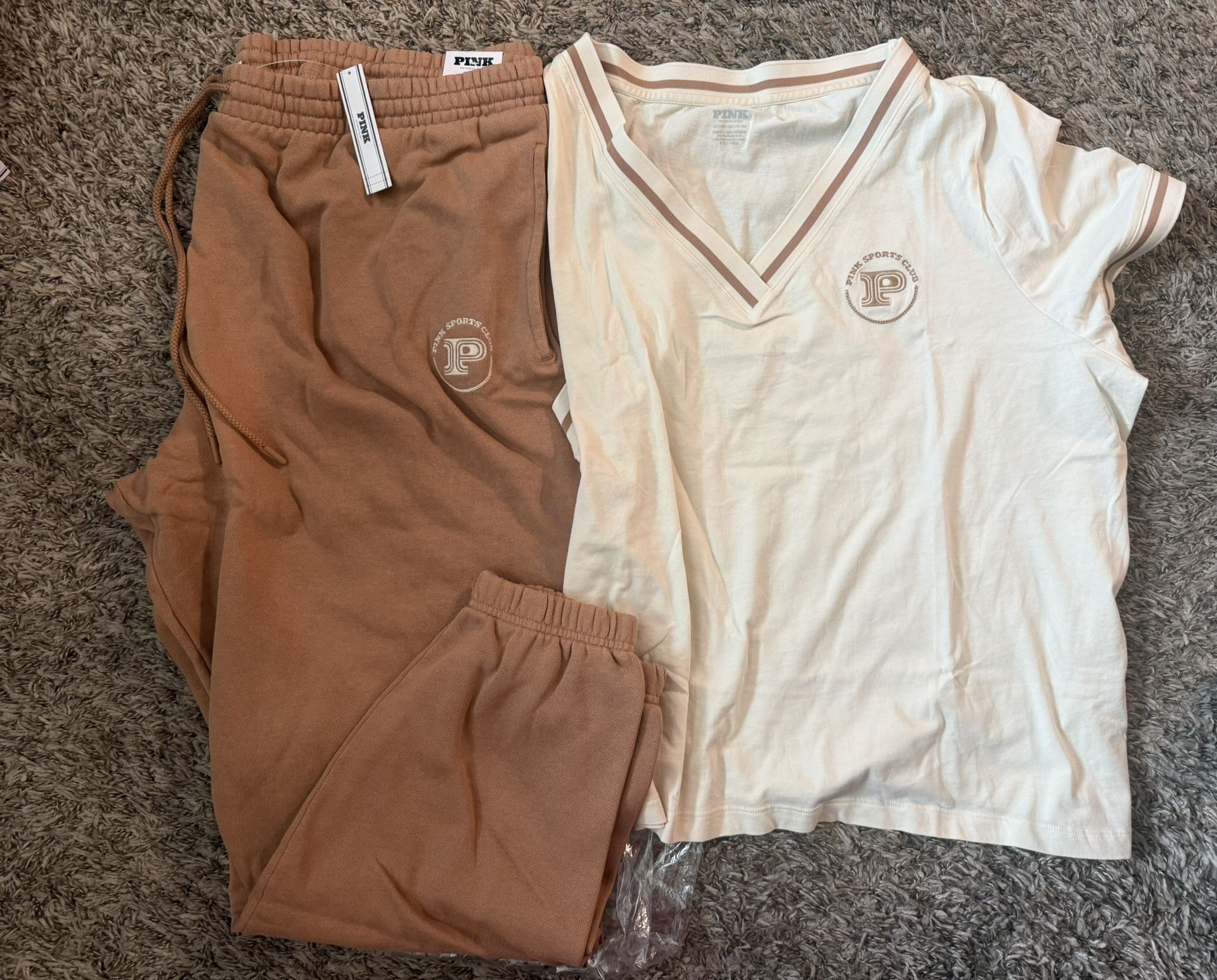 Victoria’s Secret Pink New with tags 2pc outfit set: flare pants and t-shirt Color Red Violet with off white color pink sports club logo Size Mediu