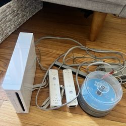 Wii Console, Controllers, And Assorted Games 