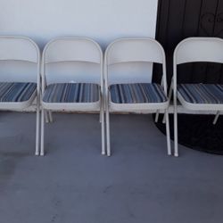 4 Folding Chairs 