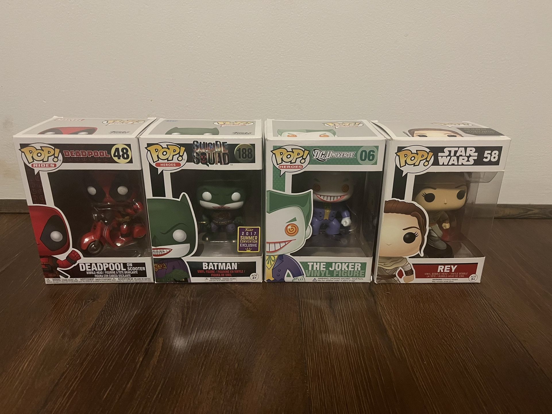 4 Funko Pop! Bobble Heads.