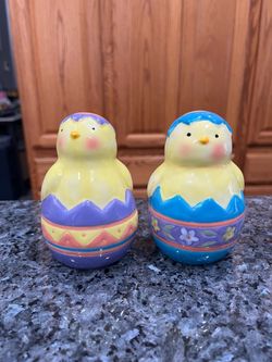 Ceramic Large Easter Egg Salt and Pepper Shakers.  Size 4 inches tall.  Brand new never used with tags on bottom.  The bottoms have a little wear from