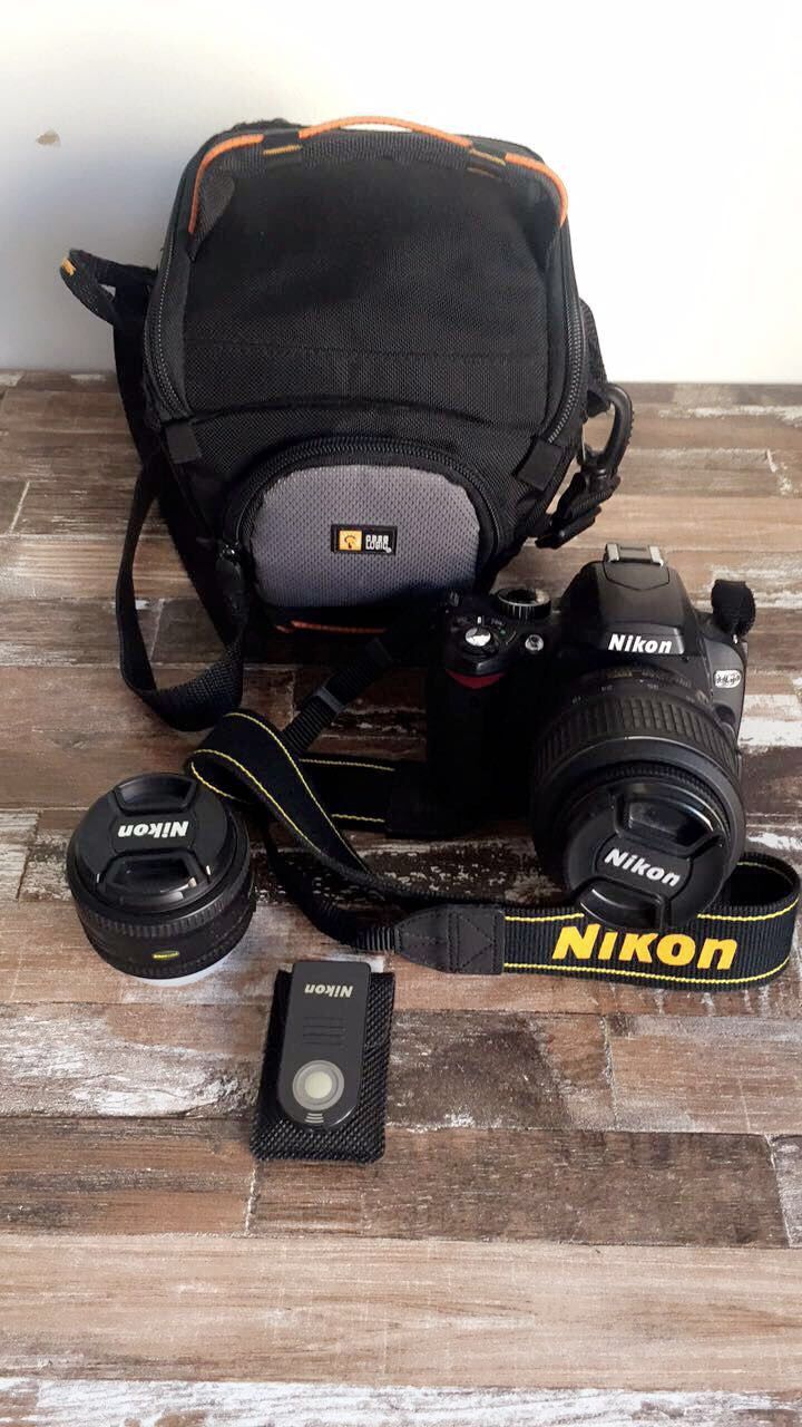 Nikon camera with two lenses.