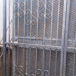 Metal. Gates And. Wood. Barrier 