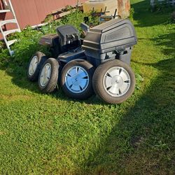 Set a 415 inch Honda tires. And rims 