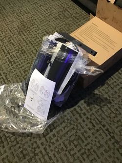 Brand new 360 degree garden hose reel with hose included.