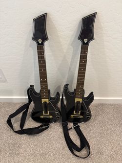 Two Nintendo Wii U Guitar Hero Guitars