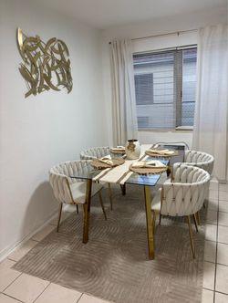 Glass dining table with four chairs, picture, decor