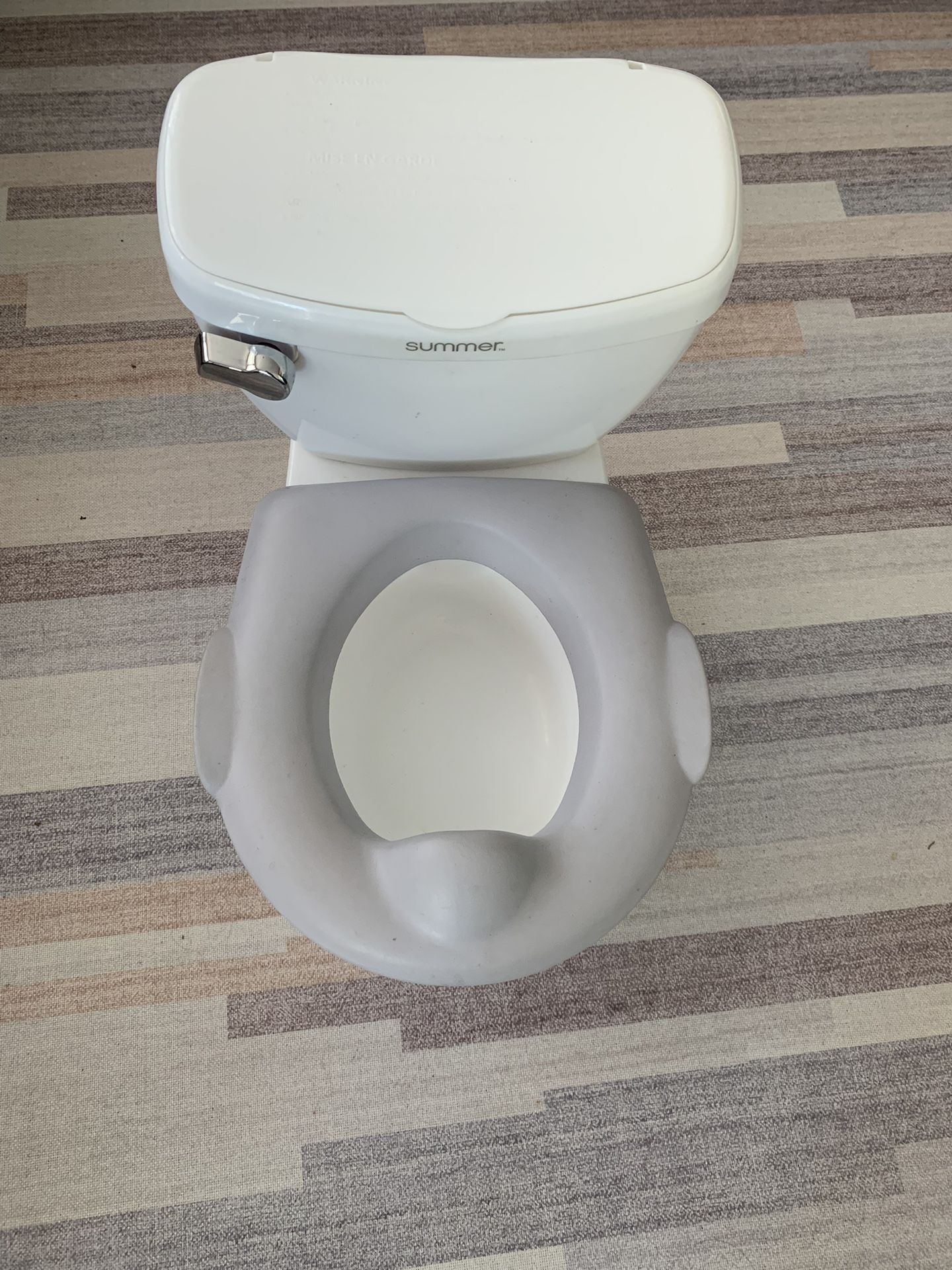 Summer By Ingenuity Potty training Toilet With Flushing sounds 