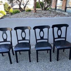 Four Dining Chairs - $100