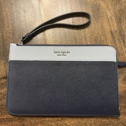 Blue kate Spade Wristlet .