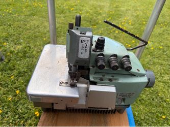 Industrial serger sewing machine