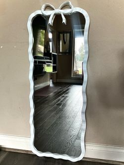 White bow mirror