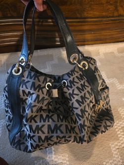 Michael Kors Signature Logo Drawstring Hobo Shoulder Bag Tan and Black