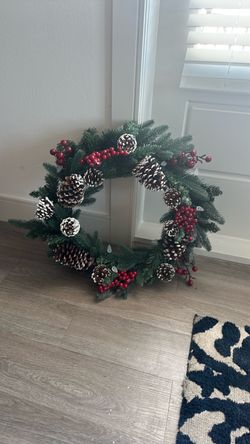 Christmas Wreath with Pinecones and Red Berries