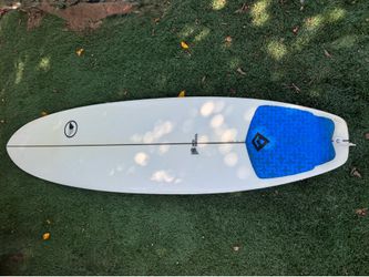 Mid length  Thruster 6’8”, local shaper