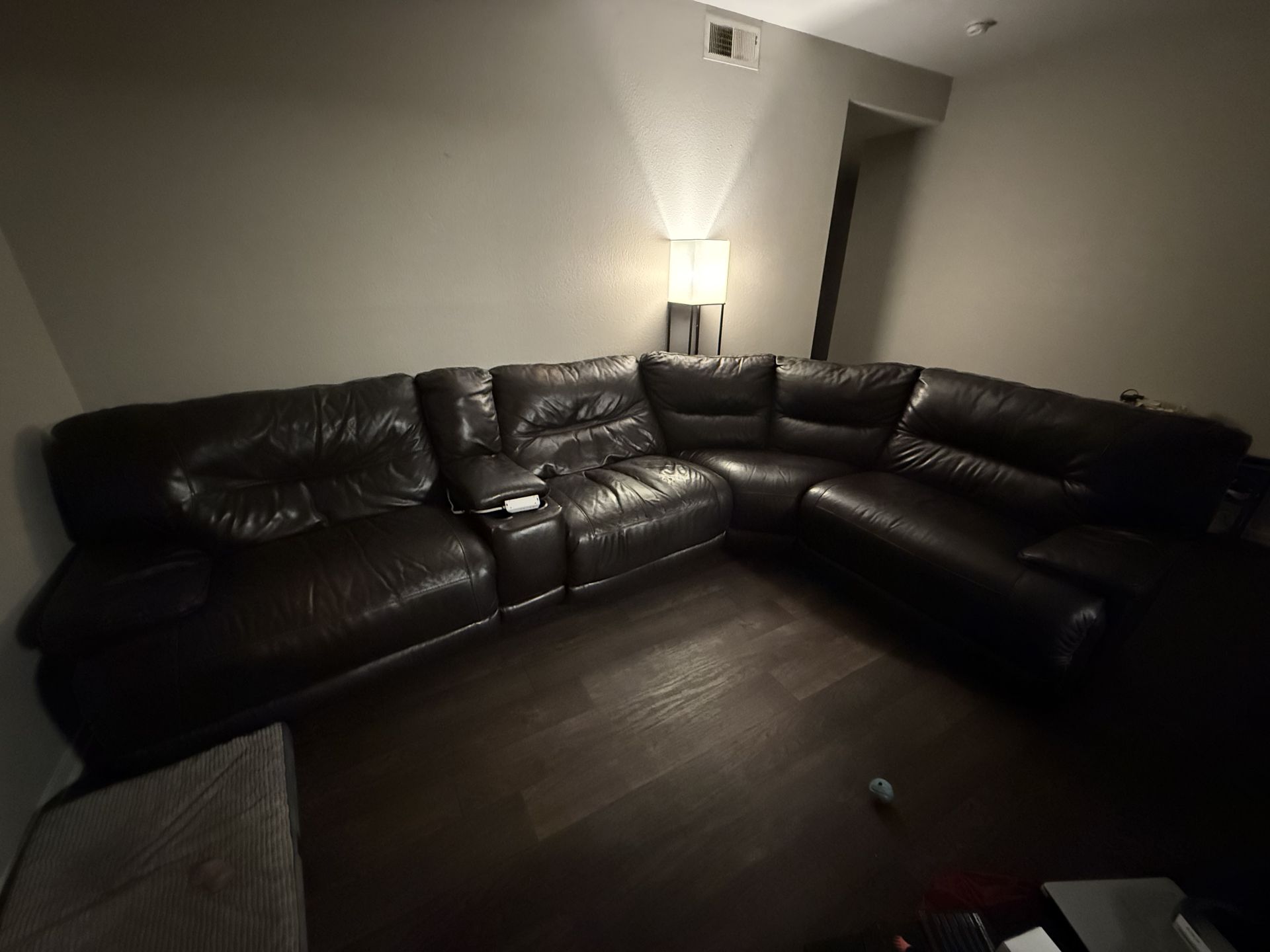 Brown leather power reclining sectional