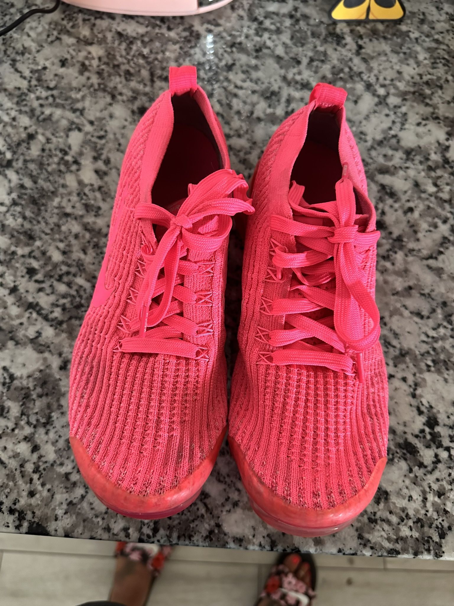 Neon pink Nikes