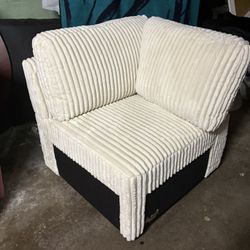 New beige corduroy corner chair.  32” x 32”  Super soft with over stuffed pillows