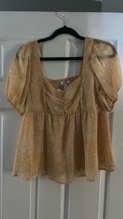 Yellow with white flowers top