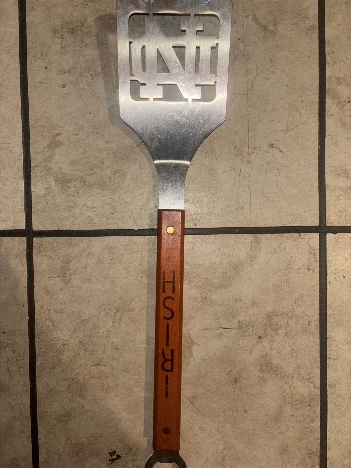 Notre Dame Fighting Irish Sportula, a grilling spatula with the team's logo