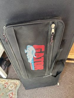 Gator semi rigid Piano soft case XL with wheels $300 retail
