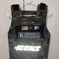 Reflective camo vest with detachable patches