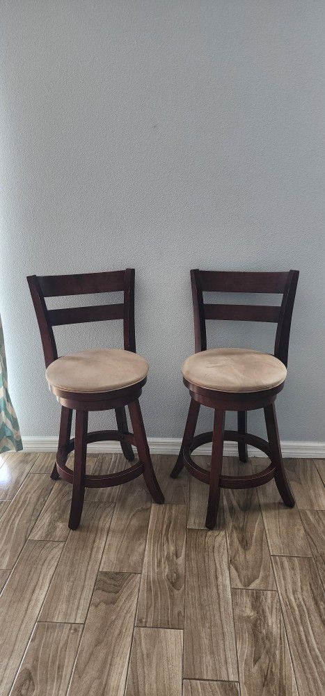 Two swivel stools