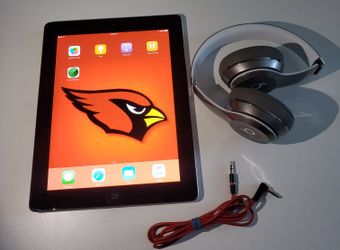 Apple IPad 1st 16GB And Beats By Dr Dre Solo Wired.  