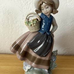 LLADRÓ Sweet Scent Girl Figurine. Porcelain Girl with Flowers Figure